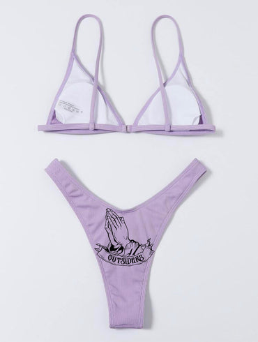 Purple bikini set with graphic design on a white background