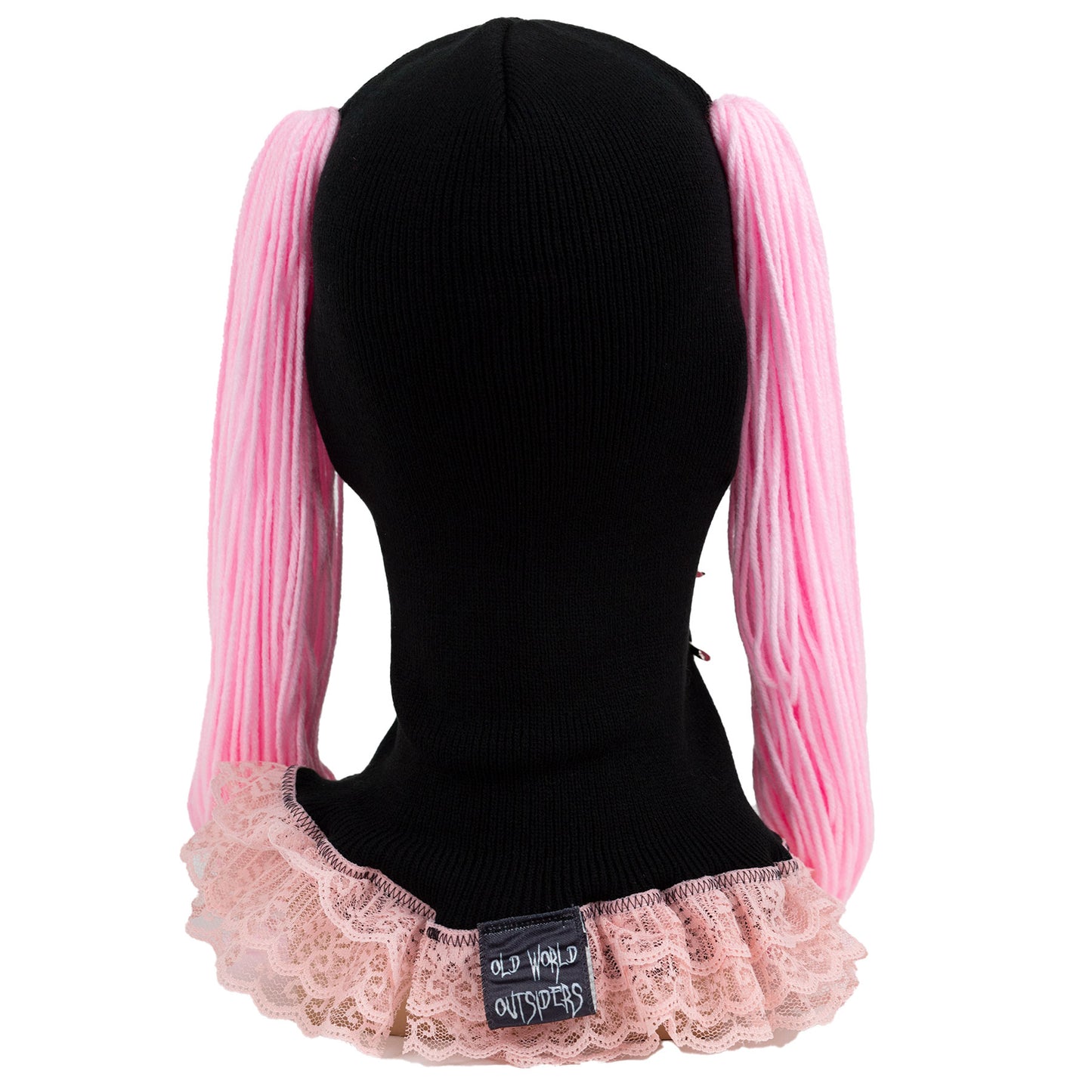 Black ski mask with pink pigtails and lace trim on a mannequin head.