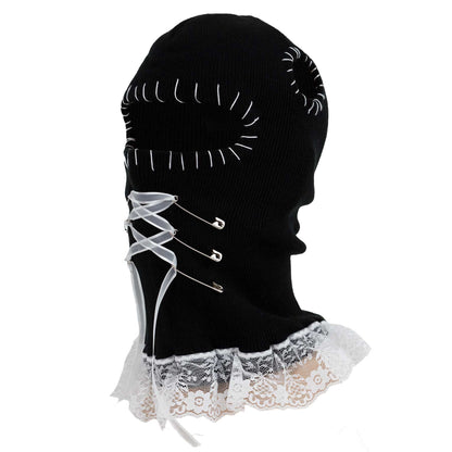 Black ski mask with white lace trim on a white background