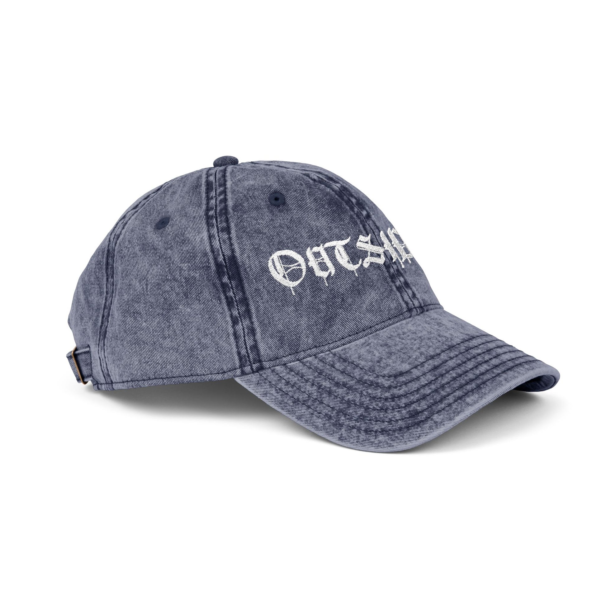 Blue denim cap with 'OUTSIDER' embroidery on a white background