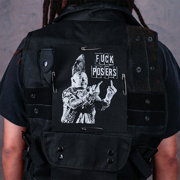 Fuck Posers patch has a image of punk guy with a mohawk giving the middle finger 