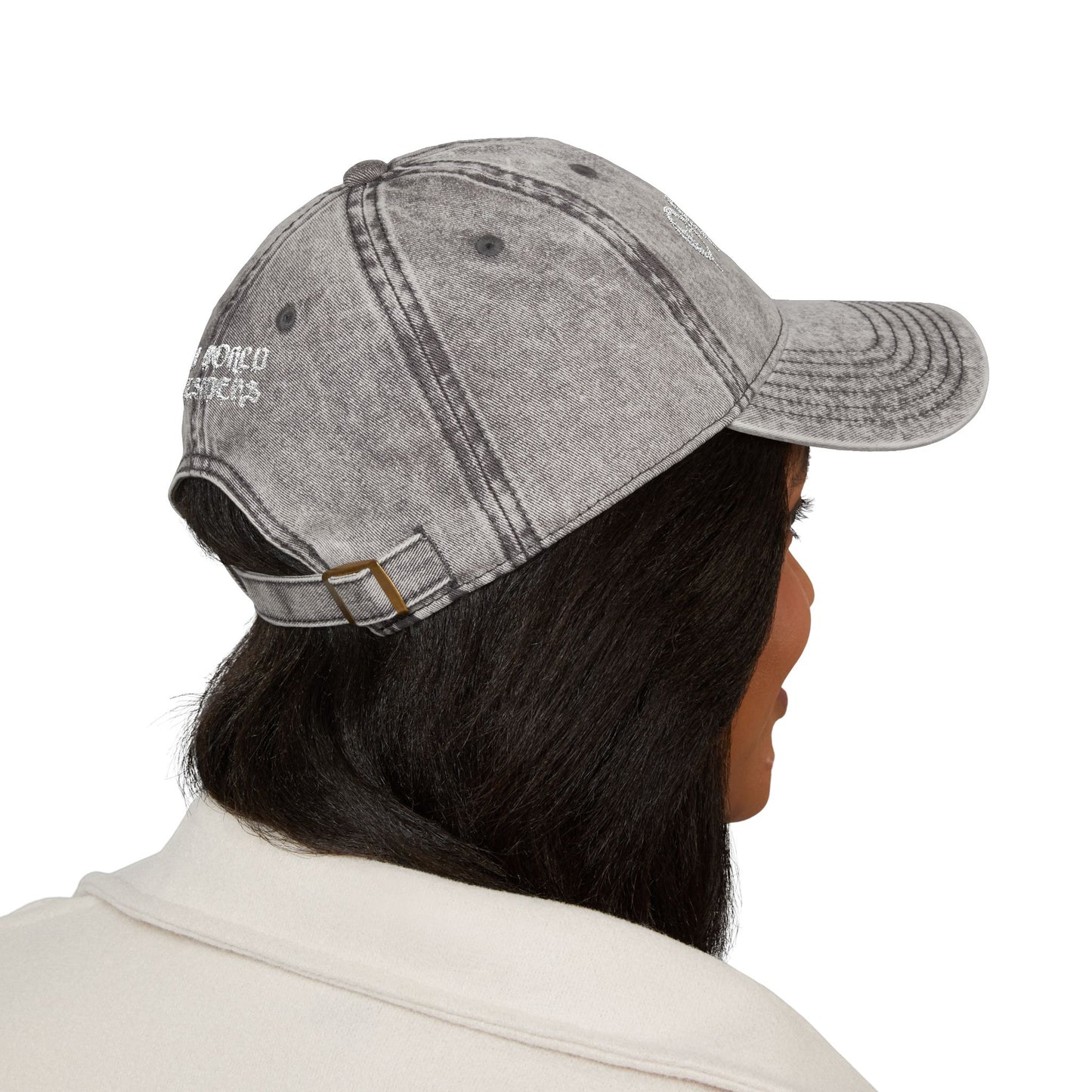 Person wearing a gray denim cap with 'Borco Outfitters' branding on a white background