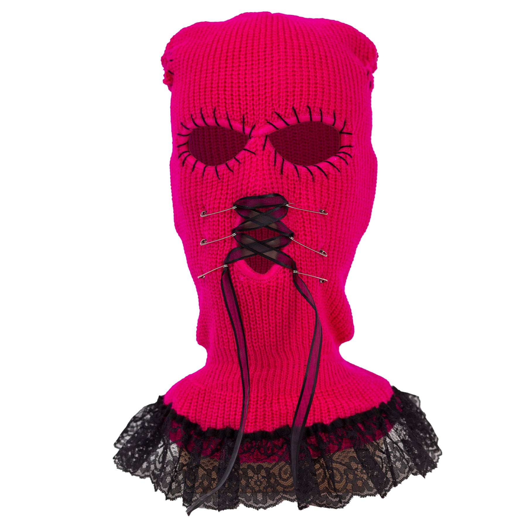 Pink knitted balaclava with black lace details on a white background