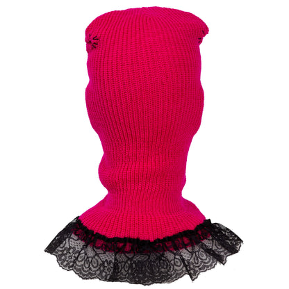 Pink knit balaclava with black lace trim on a white background
