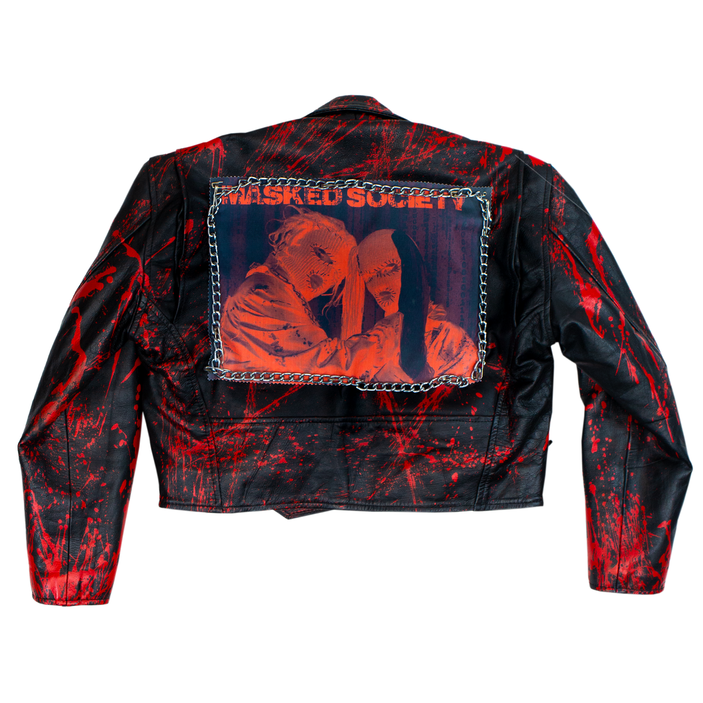 Black leather jacket with red splatter design and 'Masked Society' patch on a white background