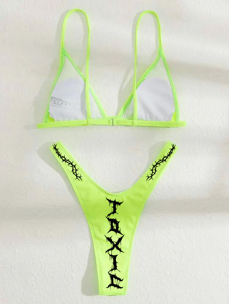 Neon green bikini set with black designs on a white background