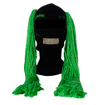 Black beanie with green braided extensions on a mannequin head against a white background
