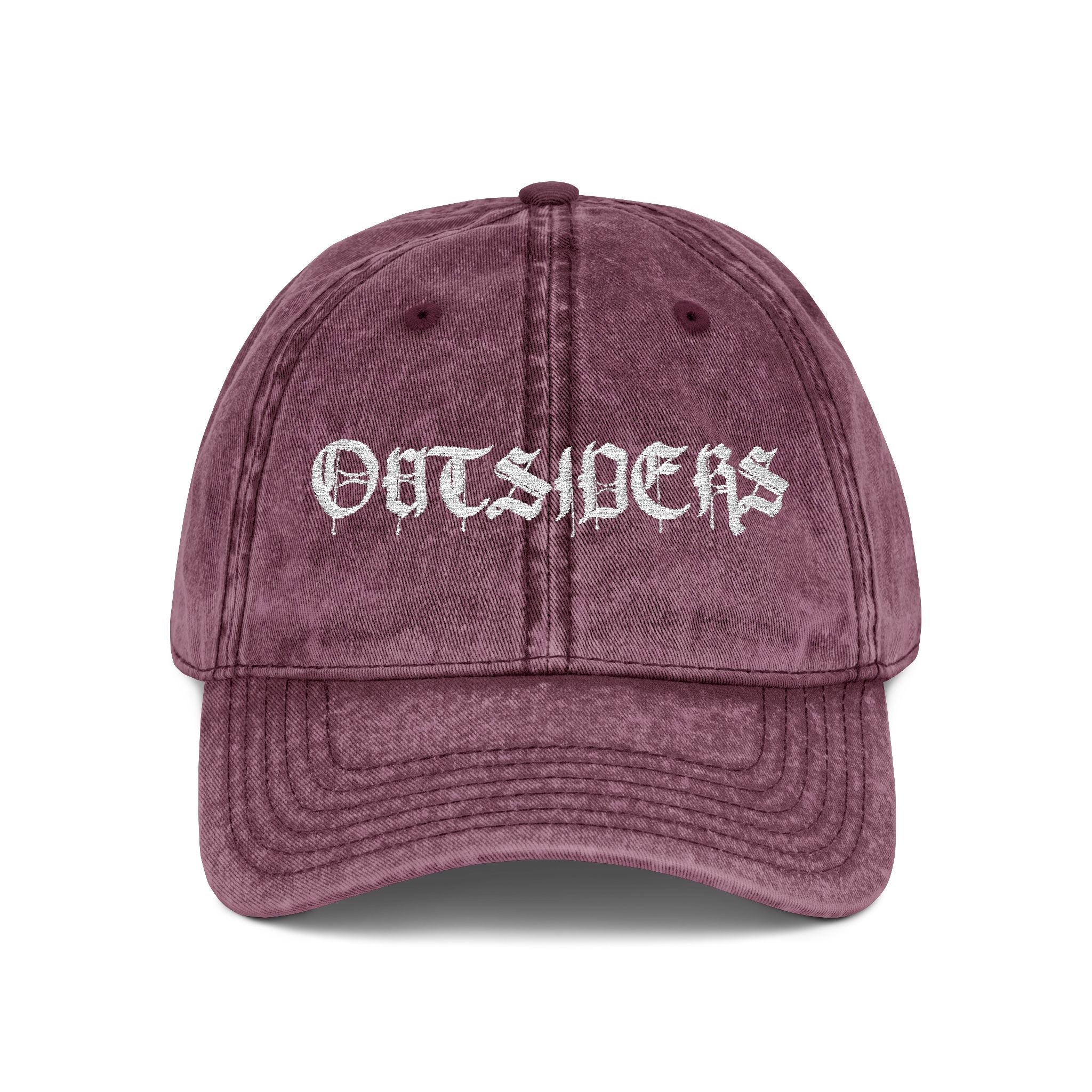 Maroon cap with 'OUTSIDERS' text on a white background