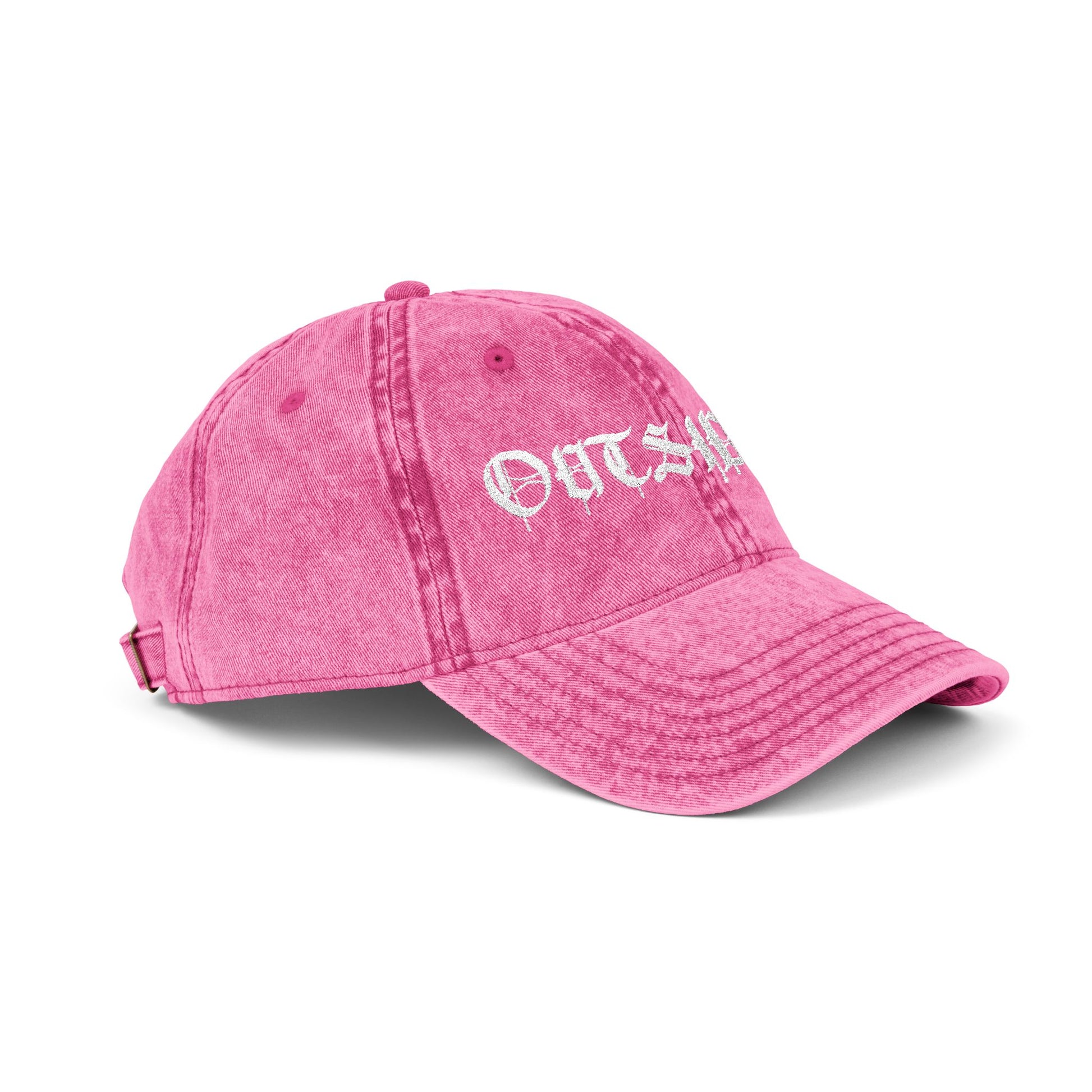 Pink cap with 'OUTSIDER' text on a white background