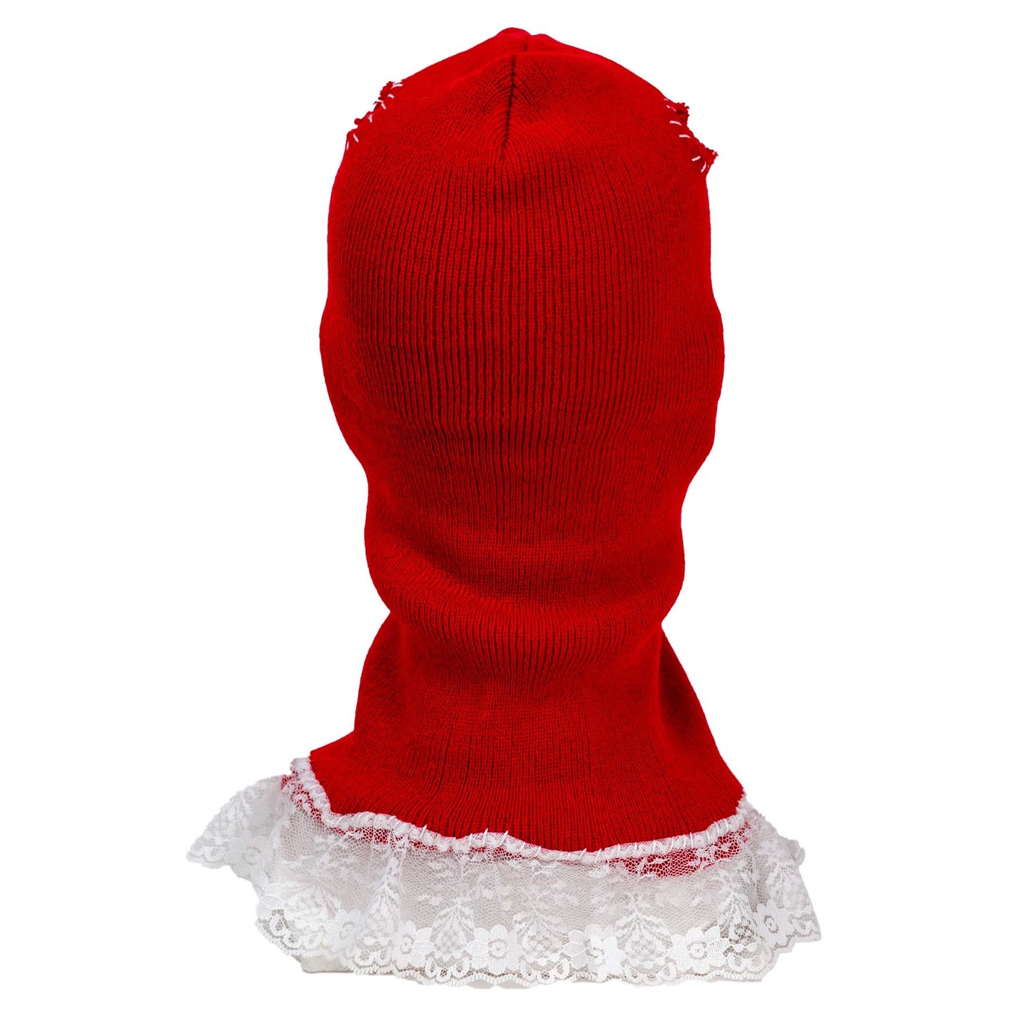 Red knitted balaclava with white lace trim on a white background