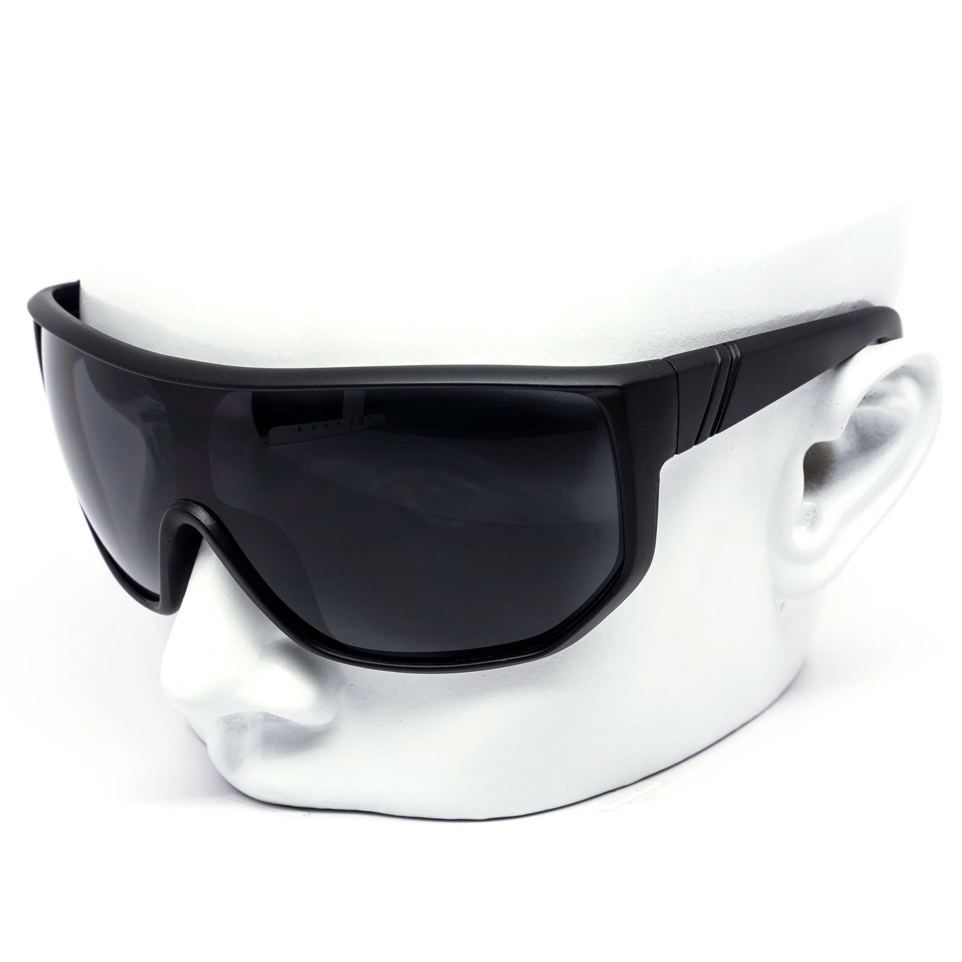 Black sunglasses on a white mannequin head with a white background